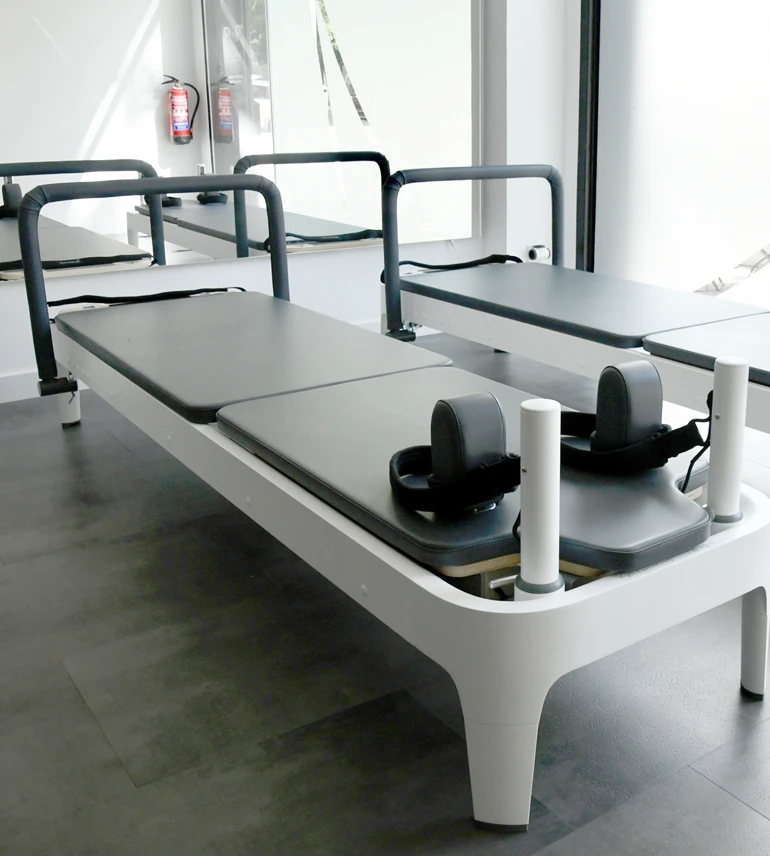 Pilates con máquina en PhysiologyLab